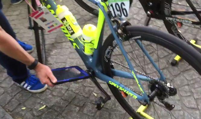UCI checking Tinkoff bike for hidden motor (source Facebook video still).JPG