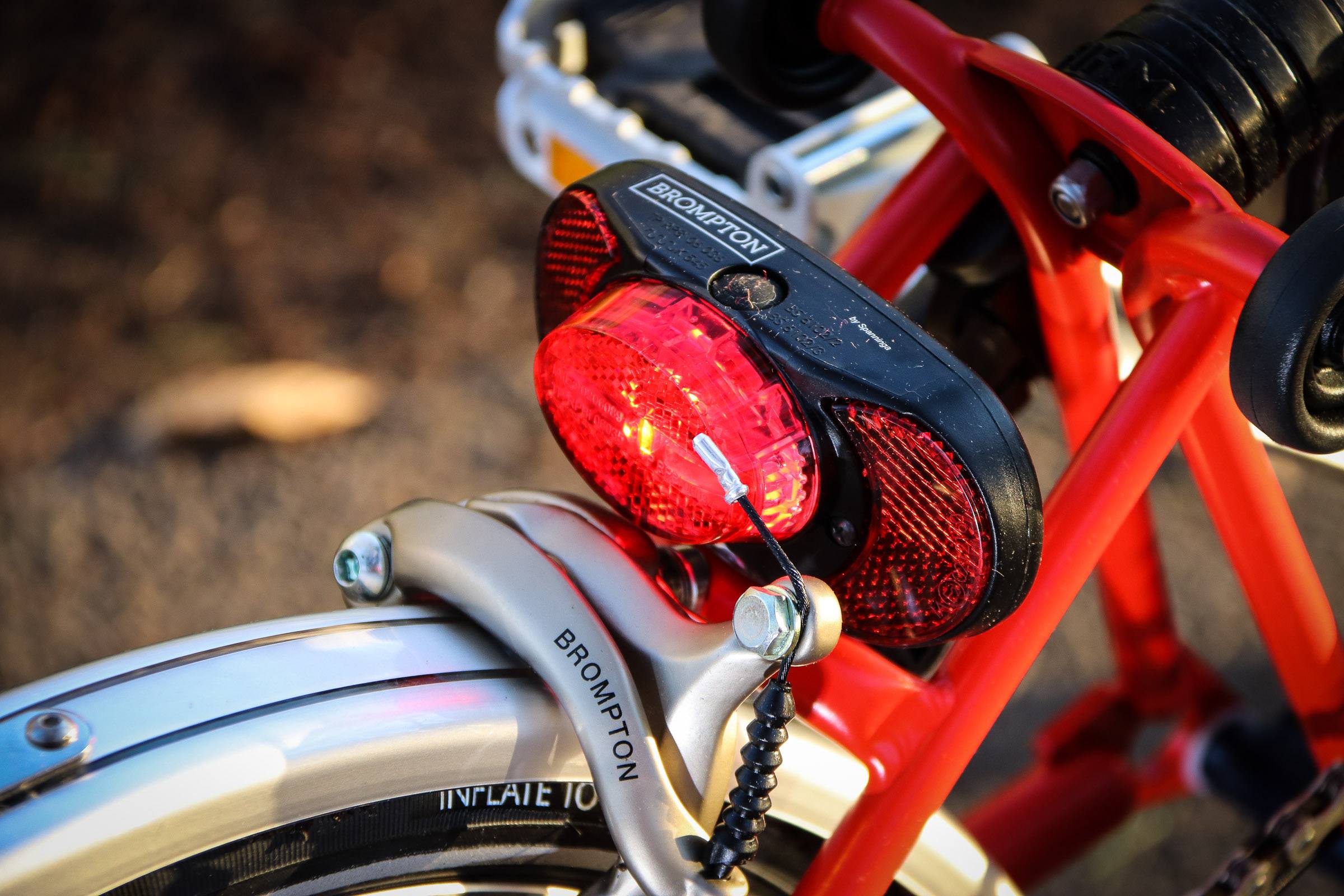 red brompton bike