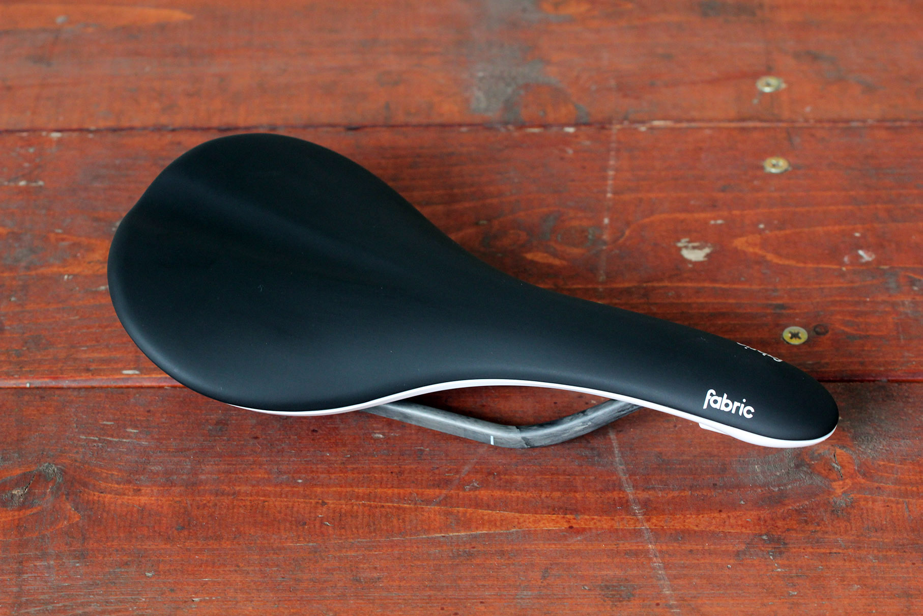 charge scoop saddle