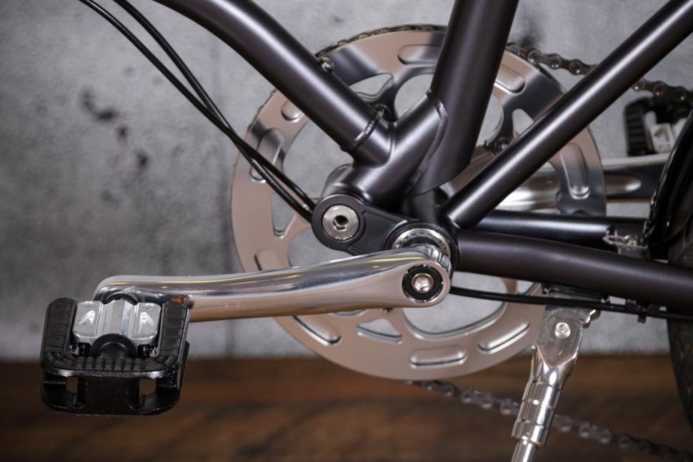 Folding bike bottom store bracket