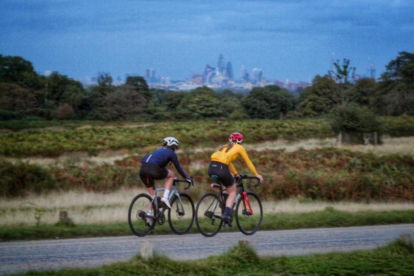 Cyclists in Richmond Park with London skyline (copyright Simon MacMichael)