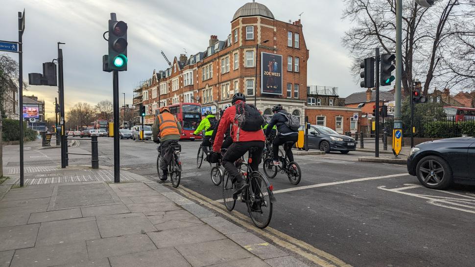 Cyclists at traffic lights, London © Simon MacMichael