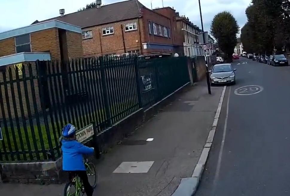 Driver mounts pavement and chastises child for riding on same footpath (Greg N, Twitter)