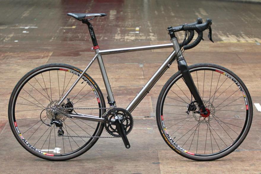 titanium v carbon bikes