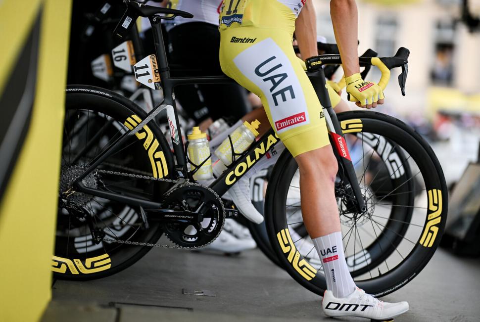 Tadej Pogacar yellow kit and yellow decals on bike