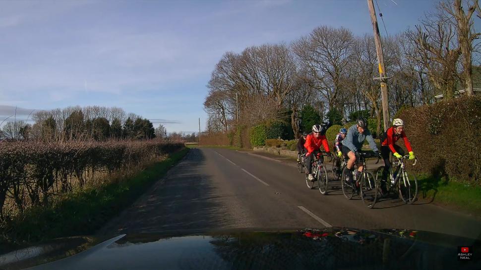 Ashley Neal video passing cyclists in opposite lane (screenshot Ashley Neal/YouTube)