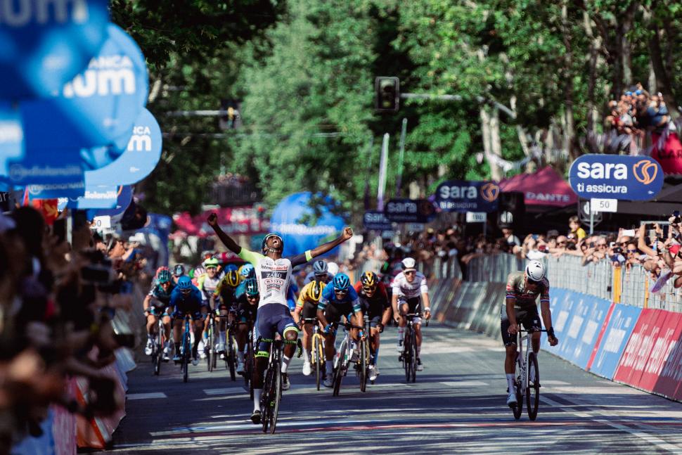 Biniam Girmay out of Giro d’Italia with eye injury after bizarre podium ...