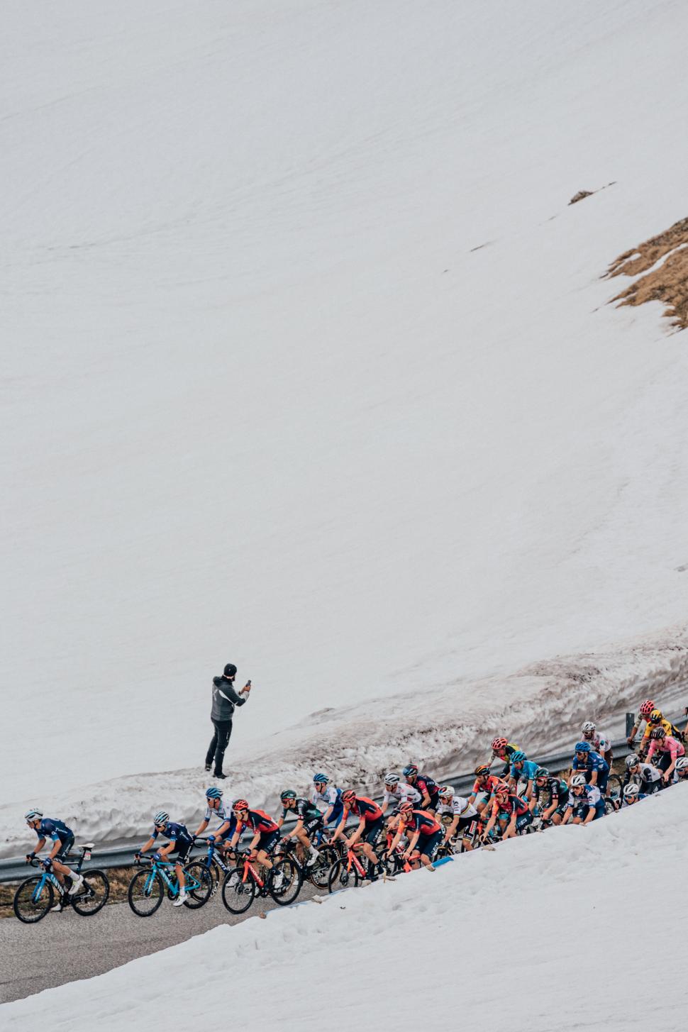 Riding through the snow at the 2023 Giro d’Italia (Zac Williams/SWpix.com)