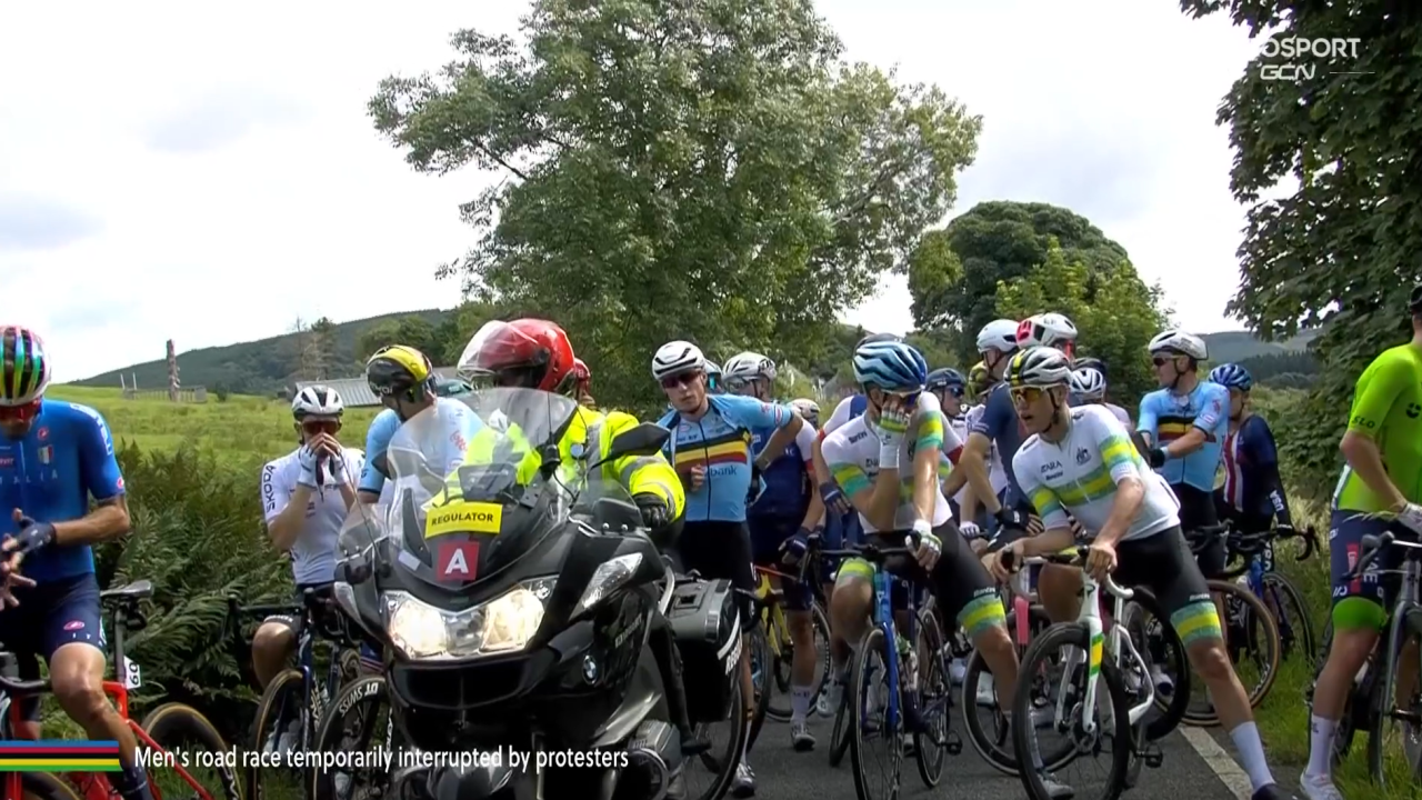 UCI Cycling World Championships road race stopped as protester reportedly “cements hand to road” road.cc