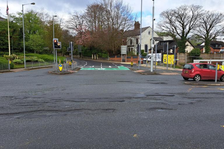 New bike box and potholes, Bury (Love Whitefield)