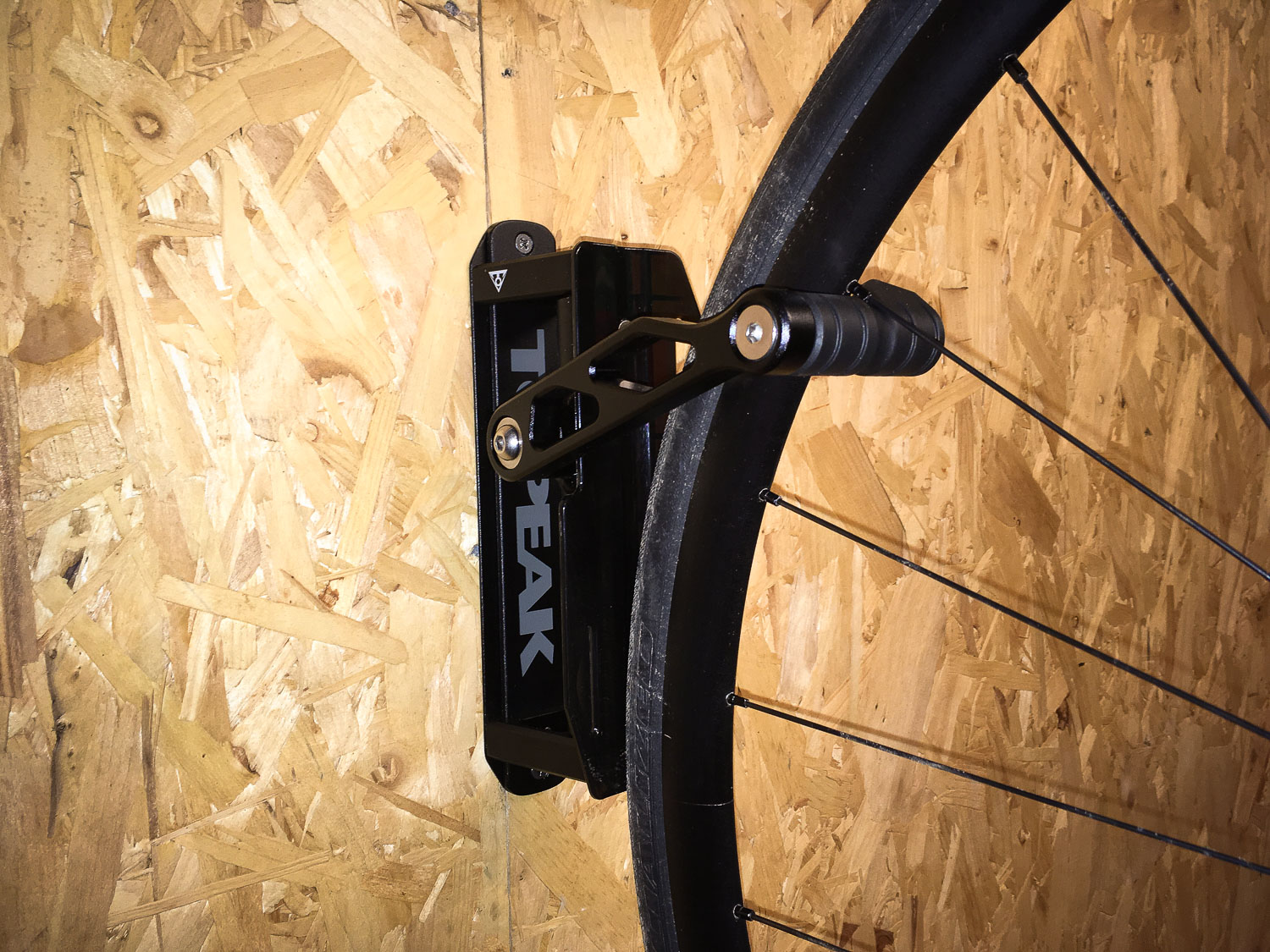 swinging bike wall mount