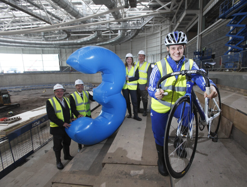 Jenny Davis and Glasgow 2014 officials at the under construction Sir Chris Hoy Velodrome.jpg