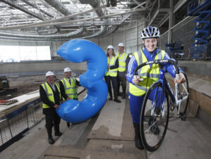 Jenny Davis and Glasgow 2014 officials at the under construction Sir Chris Hoy Velodrome.jpg