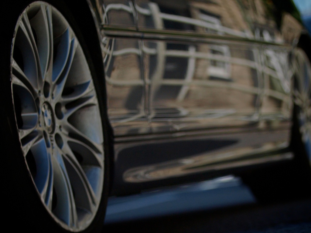 Car wheel at speed copyright Simon MacMichael.jpg