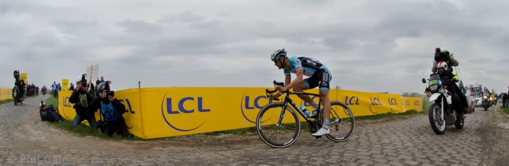 Boonen solos to the finish watched by the worlds media