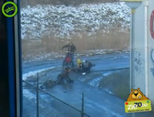 Dutch cyclists slipping on icy corner