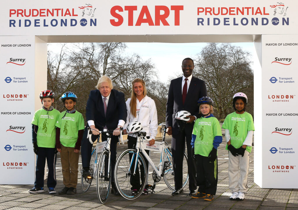 Prudential RideLondon launch, Boris Johnson, Laura Trott and Tidjane Thiam with schoolchildren