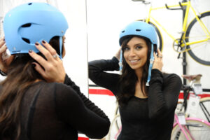 Christine Bleakley trying on a cycle helmet (picture courtesy Barclays)