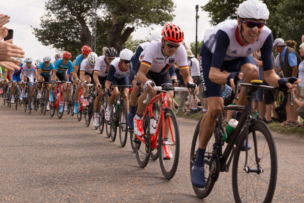 Cyclists probably breaking the speed limit in Richmond Park (CC licensed by adambowie:Flickr)