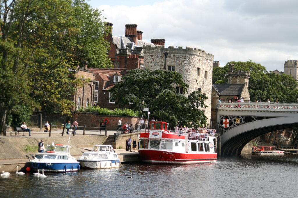 Boats on the River Ouse at York beside Lendal Bridge pic by Steve FE Cameron.JPG