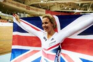 Becky James with union flag, Minsk 2013 (copyright Britishcycling.org.uk)