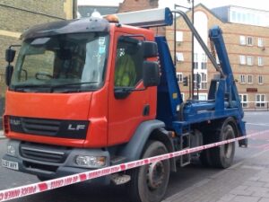 HGV skip lorry cordoned off at the scene of a cyclist s death.jpg