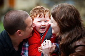Richard Page with son Ellis and wife Lianne.png