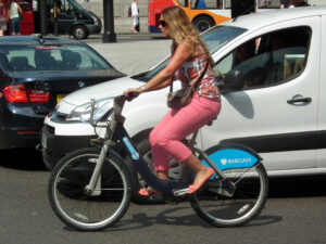 Woman on Boris Bike (CC licensed by kenjonbro:Flickr)