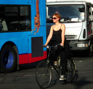 Woman on bike in London (CC licensed image by kenjonbro:Flickr)