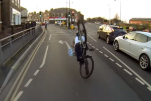 CarefulCyclist – how not to change your jacket while riding a bike.png