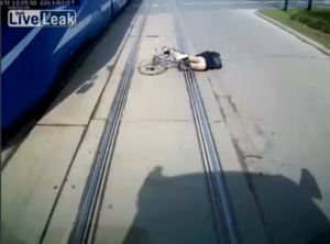 Polish cyclist attempts tram takeover.png