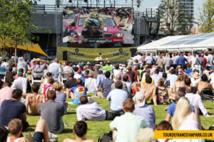 Spectators watch the action at a Tour Fan Park (©tourdefrancefanpark.co.uk)