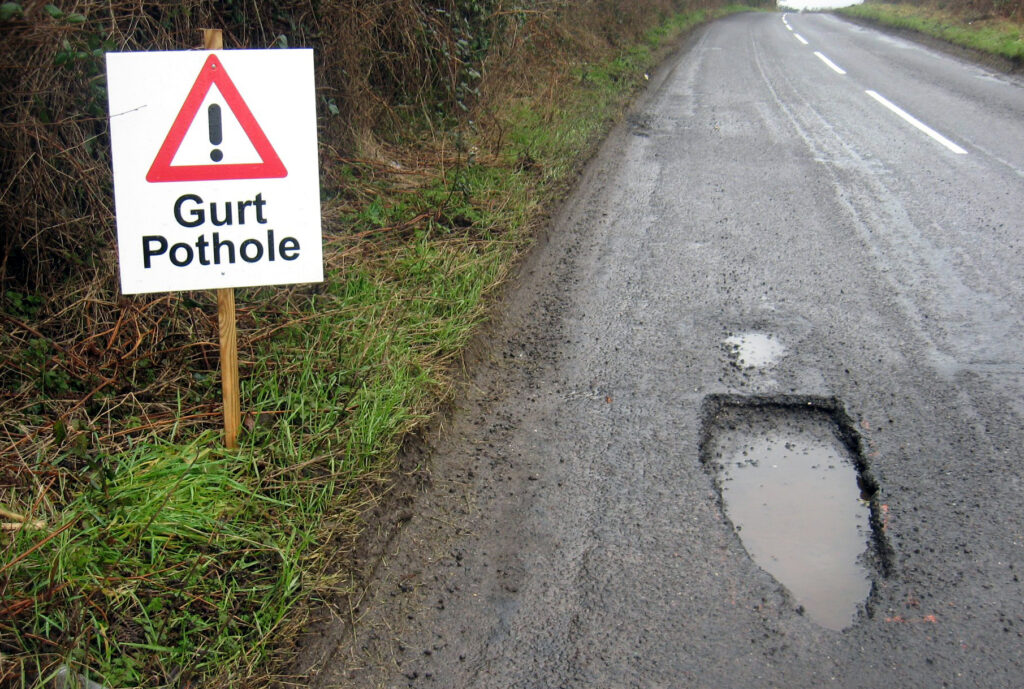 Gurt pothole (CC BY 2.0 licensed image by Brett Jordan:Flickr)