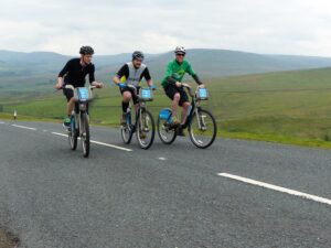The trio crest Buttertubs Pass and make it look a lot easier than it was (image ©Lewis Baguley #BORISvLeTour)