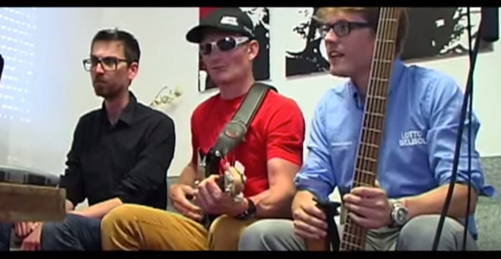 Andre Greipel playing the guitar – he sings too, apparently