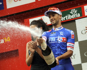 Vuelta 2014 Stage 8 Nacer Bouhanni on podium (credit Unipublic, Graham Watson)