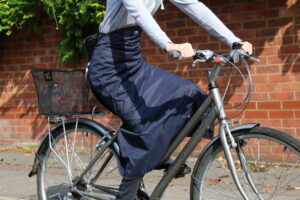 Georgia In Dublin Rainwrap - on bike 1