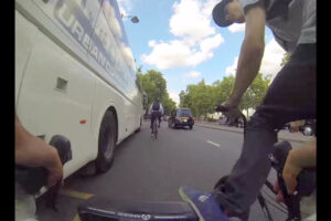 Rider on BMX kicks cyclist off bike