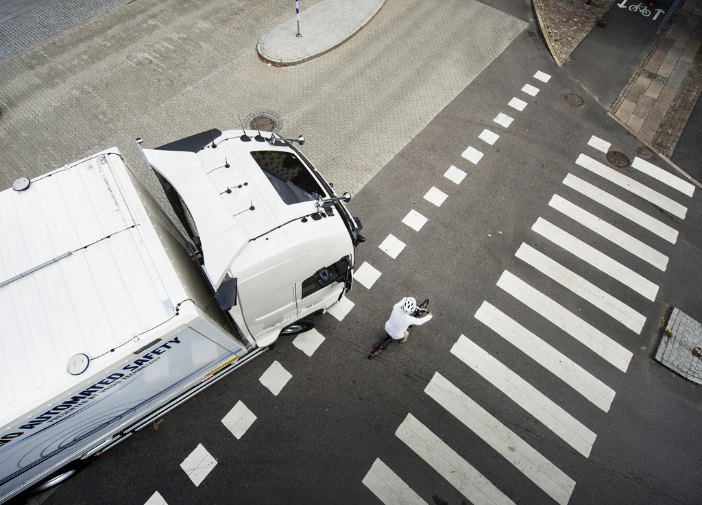 Volvo truck and cyclist