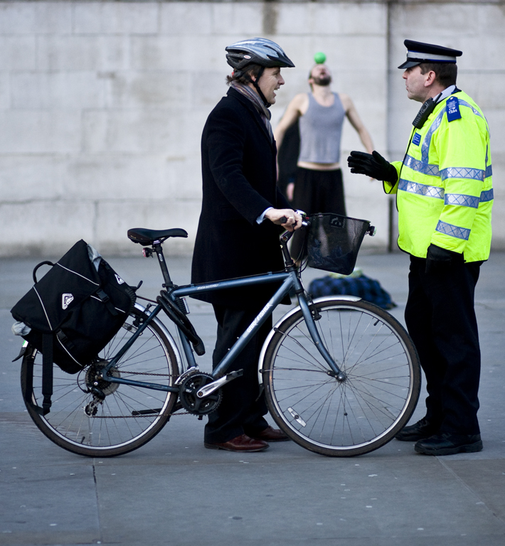 Cyclist and policeman (CC licensed image by stumayhew:Flickr)