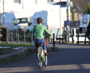 Cyclist with headphones (cc licensed by Adrian Midgley on Flickr)