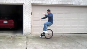 Lou riding the offset unicycle