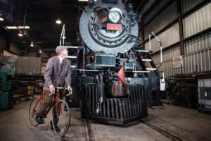 Cyclist vs steam train