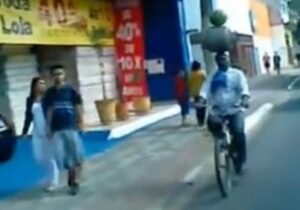 Gas canister and watermelon balancing cyclist YouTube still