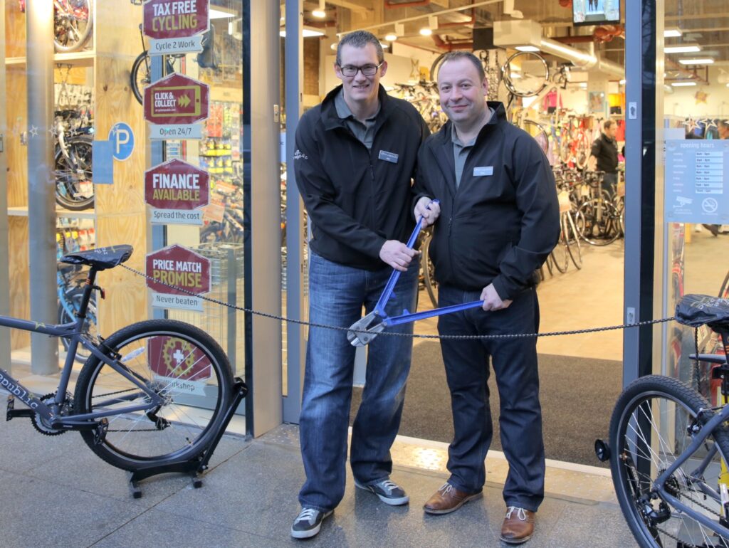 Halfords CEO Matt Davies (left, at the opening of the first Cycle Republic store) is to join Tesco and UK and Ireland CEO