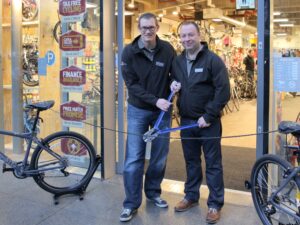 Halfords CEO Matt Davies (left, at the opening of the first Cycle Republic store) is to join Tesco and UK and Ireland CEO