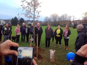 A tree is planted in memory of Kris Jarvis and John Morland (Justice for Kris Jarvis and John Morland Petition:Facebook)