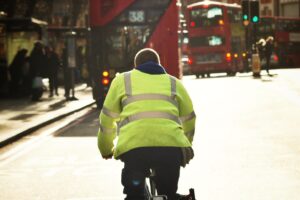 Cyclist and London buses (copyright Simon MacMichael)