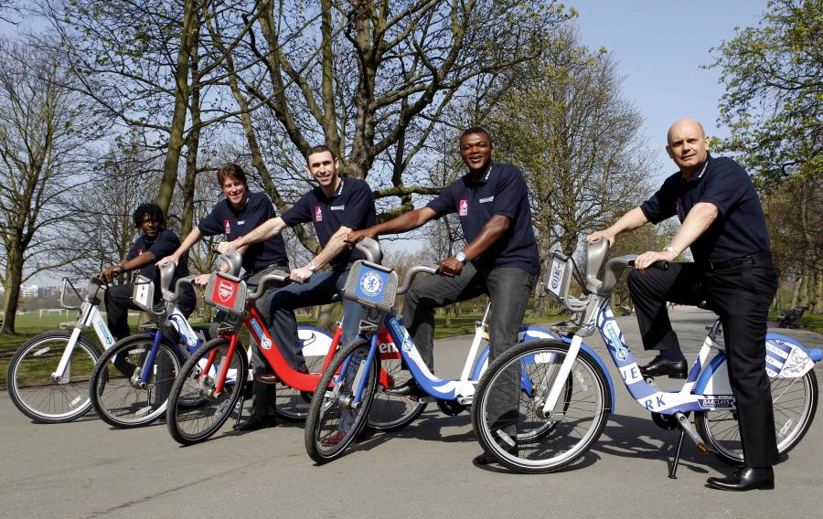 Martin Keown (centre) on a red Boris bike
