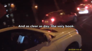 Woman reading book at wheel.png